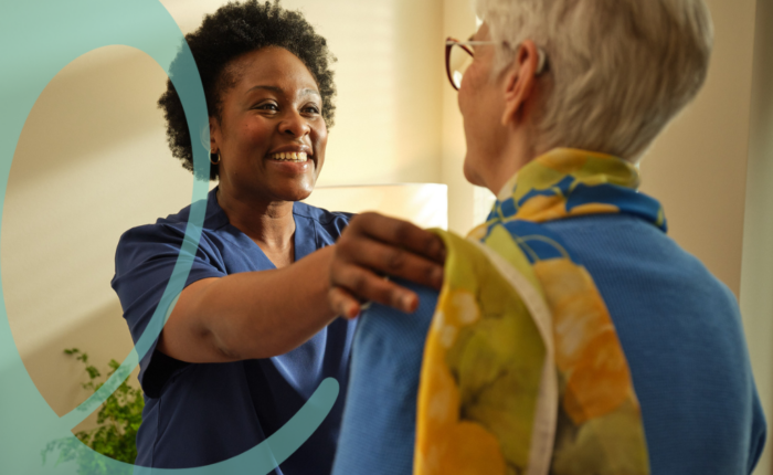 Caregiver and older adults picking out clothing