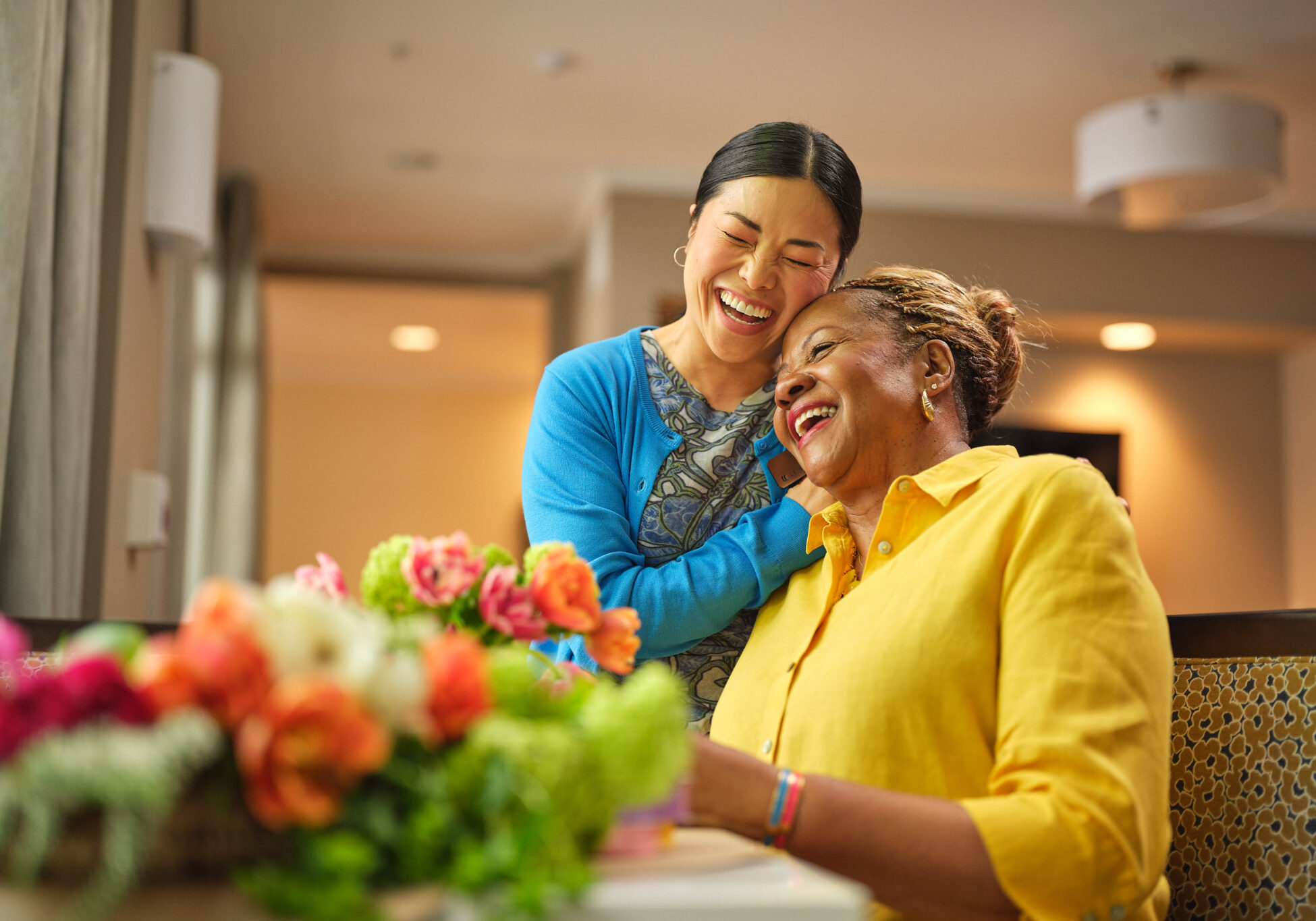 Leisure Care Careers Caregiver flower arranging with resident