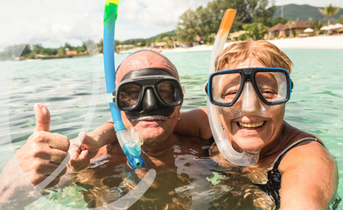 Older adults snorkeling -Travel by Leisure Care